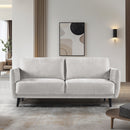 SOFA ESTACIONARIO DE TRES ASIENTOS EN TELA TEXTURIZADA BEIGE Y PATAS NEGRAS