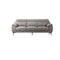SOFA ESTACIONARIO DE TRES ASIENTOS CON FRENTE DE PIEL GRIS