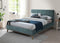 CAMA QUEEN EN TELA VERDE Y PATAS MARRONES