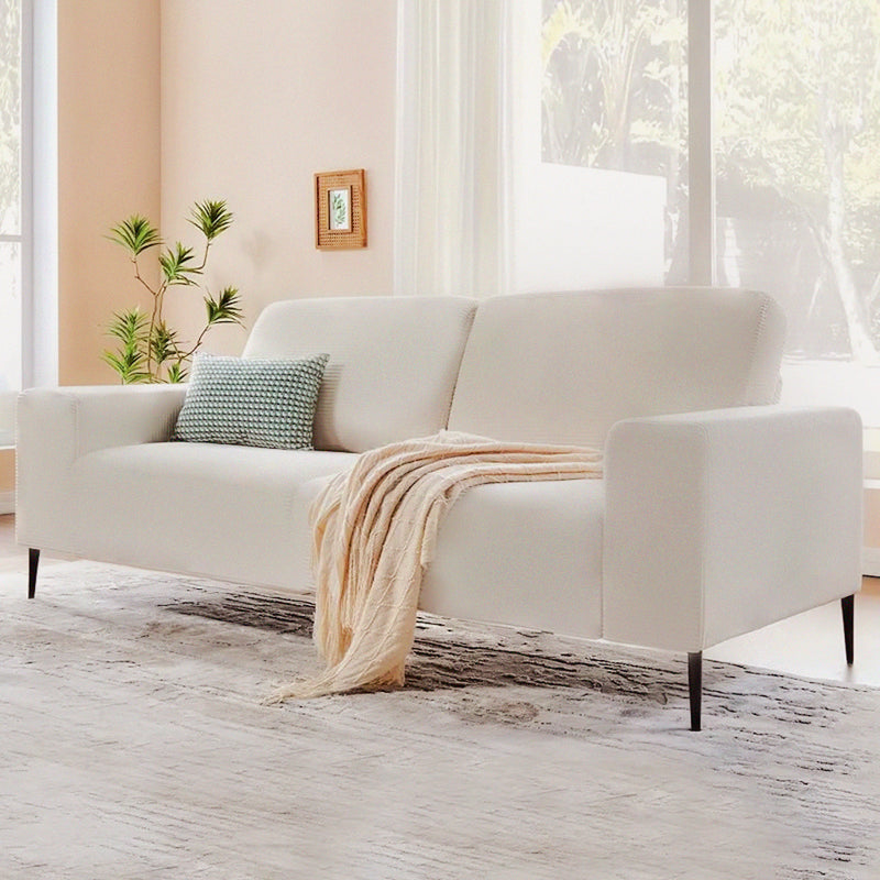 SOFA ESTACIONARIO DE TRES ASIENTOS EN TELA BEIGE