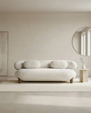 SOFA ESTACIONARIO DE TRES ASIENTOS EN TELA BEIGE