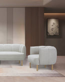 BUTACA ESTACIONARIA EN TELA GRIS Y PATAS NATURALES