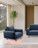 BUTACA ESTACIONARIA EN TELA AZUL Y PATAS NATURALES