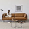 SOFA ESTACIONARIO DE CUATRO ASIENTOS CON FRENTE DE PIEL CAMEL