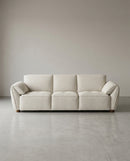 SOFA ESTACIONARIO DE TRES ASIENTOS EN TELA BEIGE