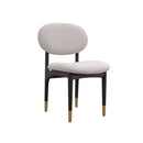 SILLA DE COMEDOR EN TELA BEIGE CON PATAS NEGRAS CON CASQUILLOS DORADOS