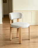 SILLA DE COMEDOR EN TELA BEIGE Y PATAS EN METAL ESTILO MADERA