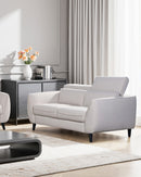 SOFA ESTACIONARIO DE DOS ASIENTOS EN TELA BEIGE GRISACEA Y PATAS NEGRAS