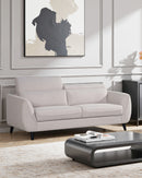 SOFA ESTACIONARIO DE TRES ASIENTOS EN TELA BEIGE GRISACEA Y PATAS NEGRAS