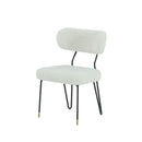 SILLA DE COMEDOR EN TELA BLANCA Y PATAS NEGRAS CON CASQUILLOS DORADOS