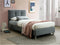 CAMA TWIN TAPIZADA EN TELA GRIS  Y PATAS PLATEADAS